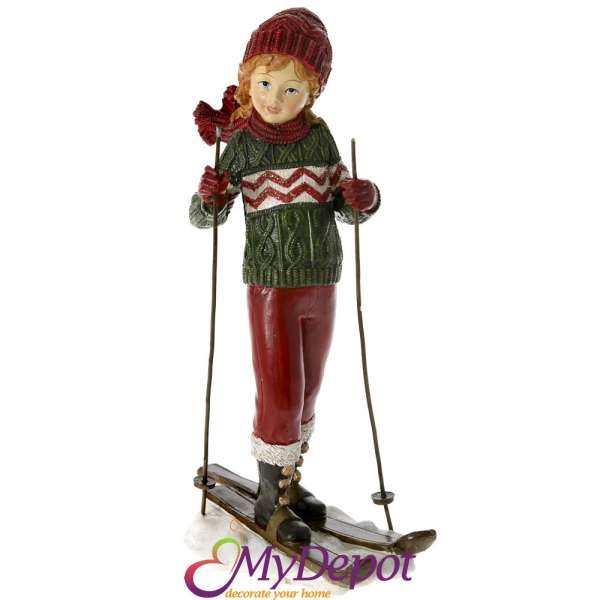 Керамична фигурка, дете със ски, червено - зелено, 13х9х21 см