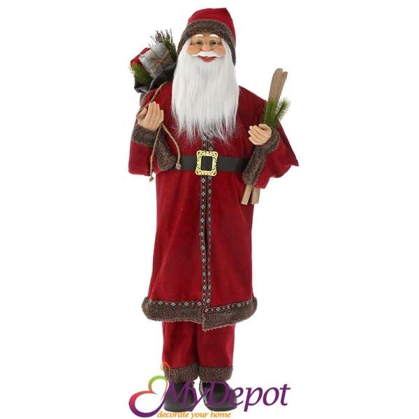 Дядо Коледа с бордо кадифен костюм носещ чифт ски, 110 см