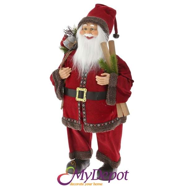 Дядо Коледа с бордо кадифен костюм носещ чифт ски, 80 см